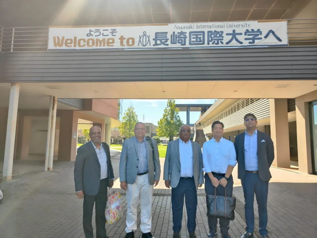 Bhrighu team at the entrance of Nagasaki International University